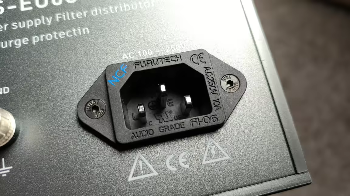 The AS-EU08's audio-grade Furutech NCF FI-06 IEC power inlet, letting you fit your own power cable