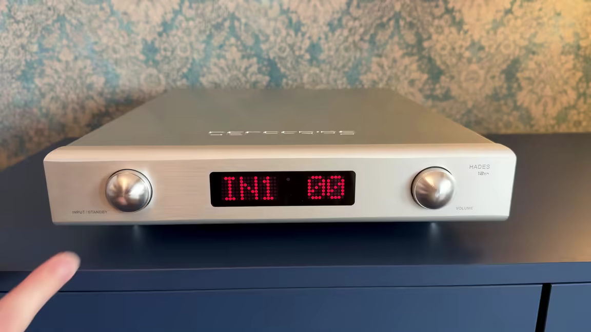 The Denafrips Hades 12th's brushed-aluminium front: an input/standby knob, the red dot-matrix volume display, and the volume knob