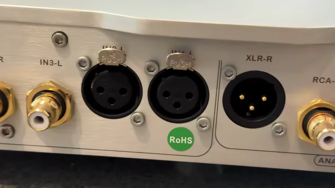 The Hades 12th's rear panel: gold-plated RCA jacks flanking balanced XLR inputs and outputs, all clearly labeled
