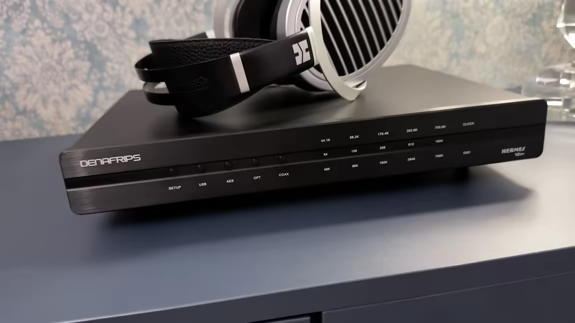 The black Denafrips Hermes 12th's low-profile aluminium chassis, its row of input indicator LEDs and sample-rate labels beside the branding