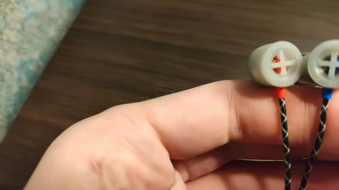 The Flare Audio E-PROTOTYPE's unusual 3D-printed 'Mirror Image' earpieces with cross-shaped faces