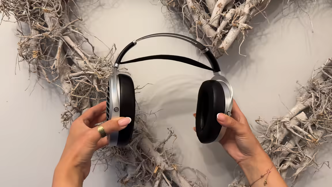 The Ananda Nano held up, showing its very large earcups and three-material hybrid ear pads