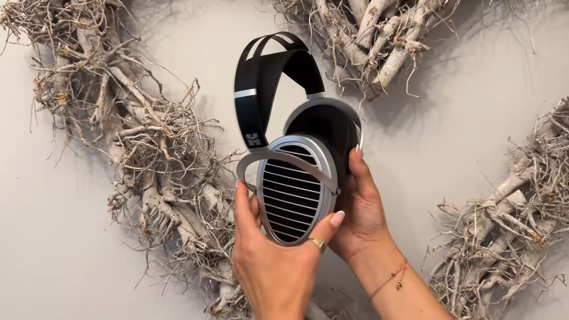 The Ananda Nano's silver earcup with its open Window Shade grille of horizontal slats