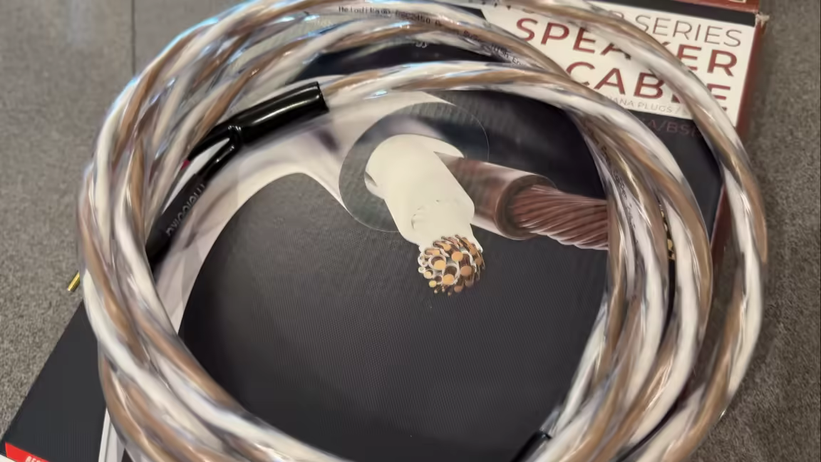 The coiled BSSC4500 cable beside a cross-section showing its mix of conductor diameters - the thick BassCore among finer strands