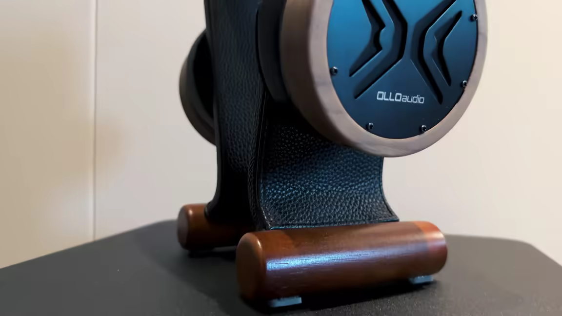 The OLLO Audio X1's machined real-wood earcup and stylized X cutout faceplate