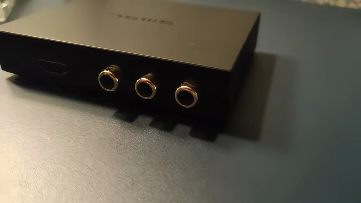 The SMSL PS100's rear ports: USB-C, HDMI, optical, coaxial, and RCA analogue outputs