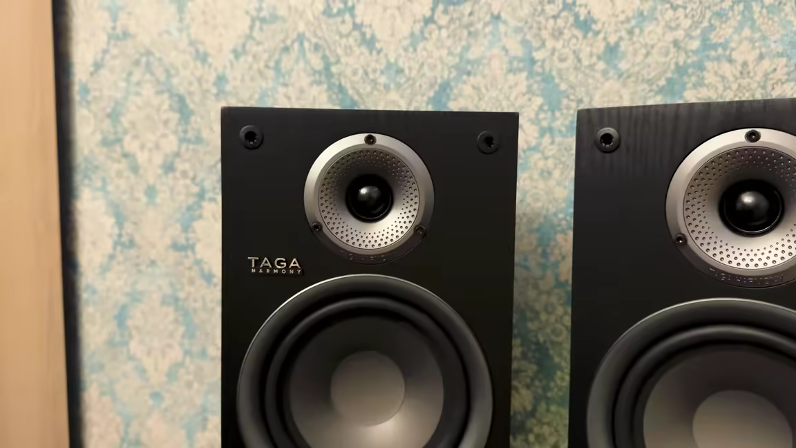 The pair of TAV-500B v.2 speakers in black veneer, each with a silk dome tweeter, Taga Harmony badge, and 6.5-inch mid-woofer