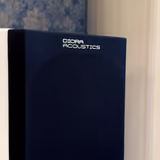 Diora Acoustics Chors 5 floor-standing closed-box ceramic speakers - left side of a head-to-head comparison with Triangle Australe EZ