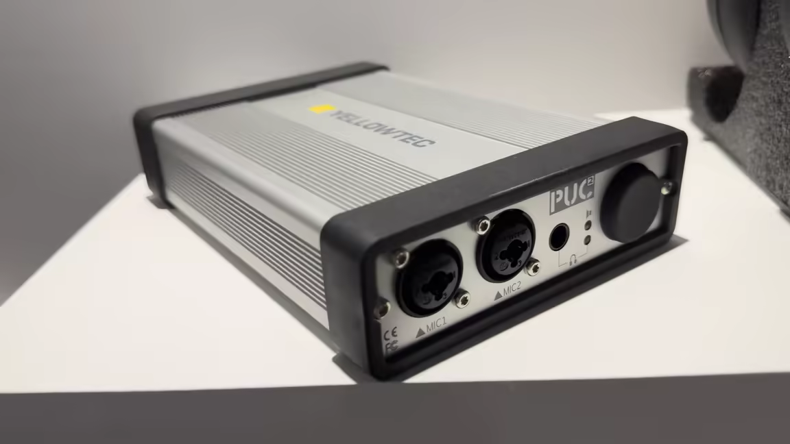 The Yellowtec PUC2 Mic LEA's ribbed silver-aluminium chassis with the yellow Yellowtec logo, rubber end bumpers, and the PUC2 front face